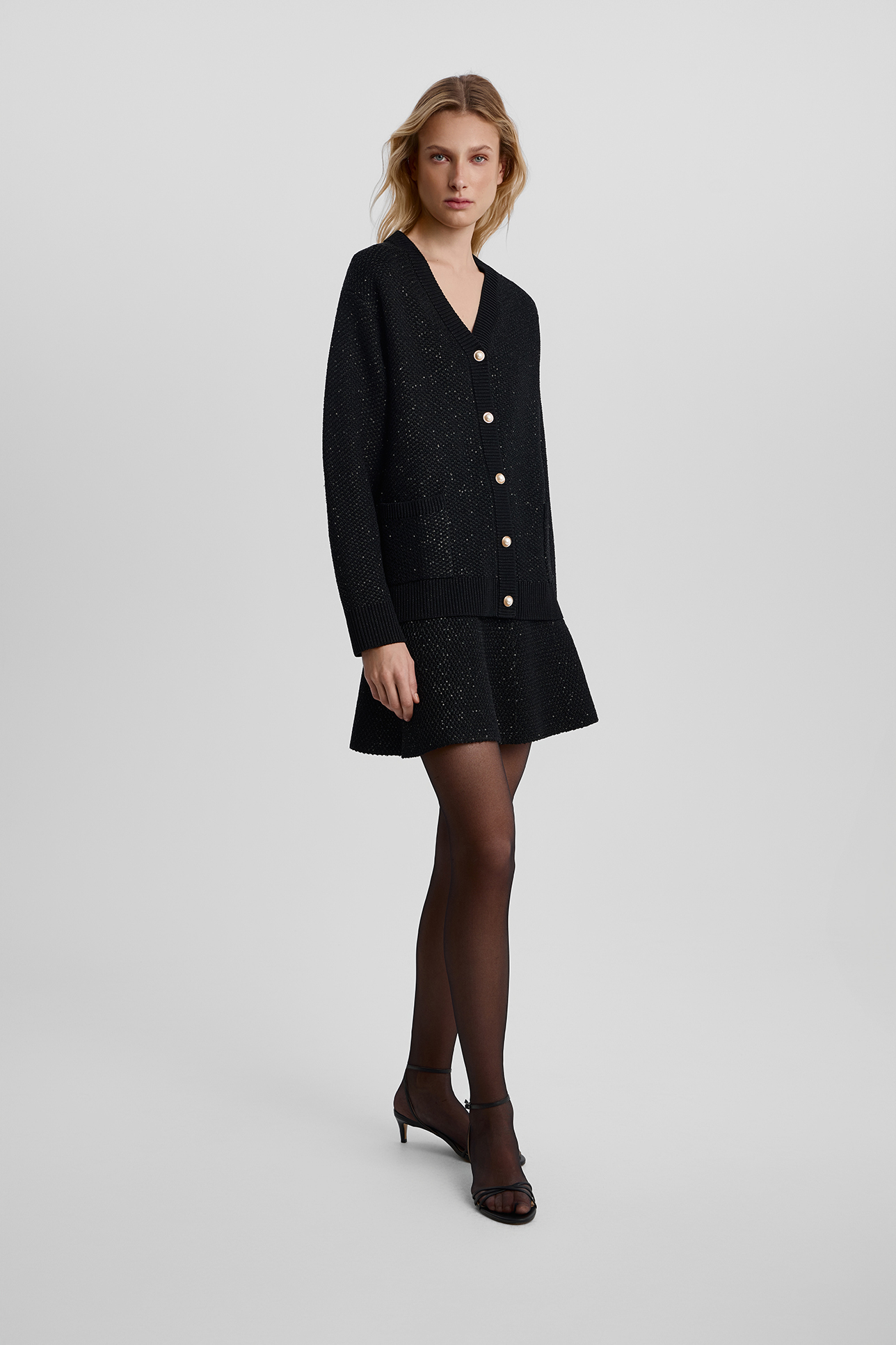 

Юбка мини с пайетками черного цвета, M